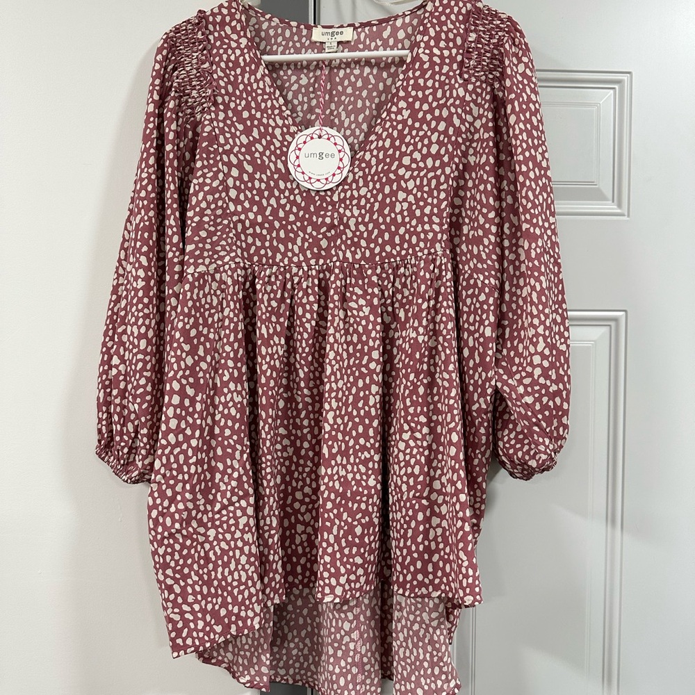 pink poka dot blouse